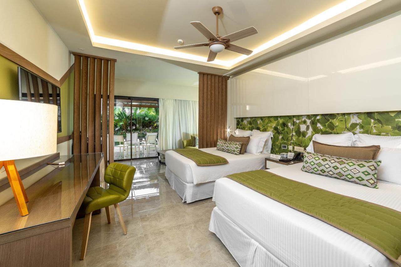 Suite Junior Premium con vistas tropicales (2 adultos + 2 niños)